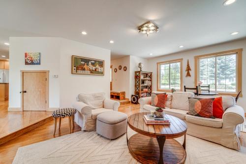 a living room with a couch and a table at Private Hot Tub Spacious Family Home in Truckee! in Truckee
