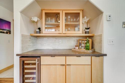 a kitchen with wooden cabinets and a counter top at Private Hot Tub Spacious Family Home in Truckee! in Truckee
