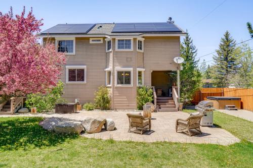 a home with a patio with chairs in the yard at Private Hot Tub Spacious Family Home in Truckee! in Truckee