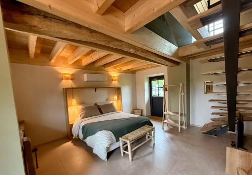 Postel nebo postele na pokoji v ubytování Au Détour des Châteaux