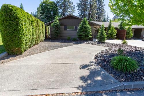 a driveway in front of a house at Spacious 3BR Family Retreat w Fire Pit BBQ Smart TVs & More in Spokane Valley