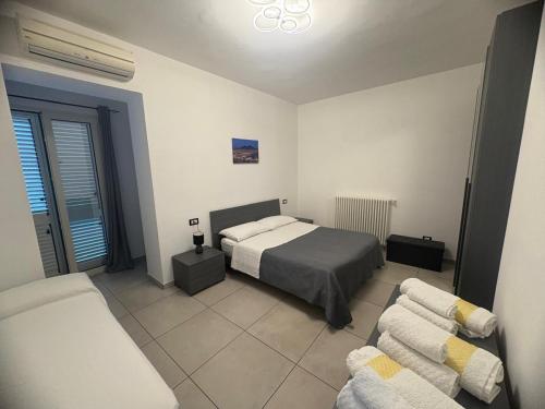 Ένα ή περισσότερα κρεβάτια σε δωμάτιο στο Sweet home. Casa vacanza Ischia.