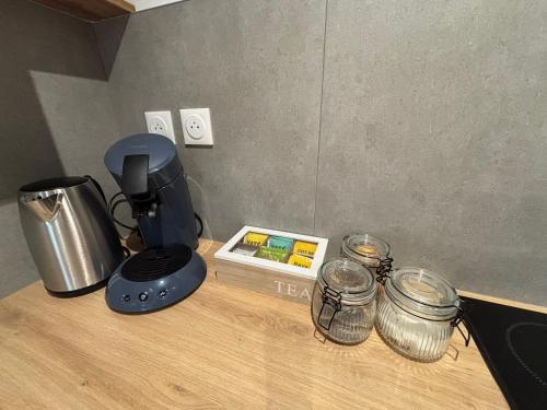 Tiện nghi pha trà/cà phê tại Appartement cosy et équipé