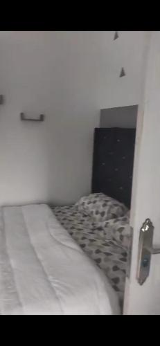 Postel nebo postele na pokoji v ubytování Greenford House Short Stay Owerri