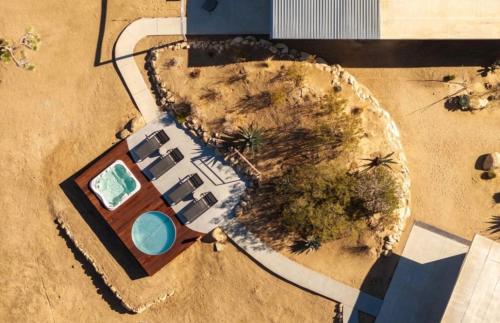 an overhead view of a villa with a swimming pool at Steel & Solace By The Cohost Company in Pioneertown
