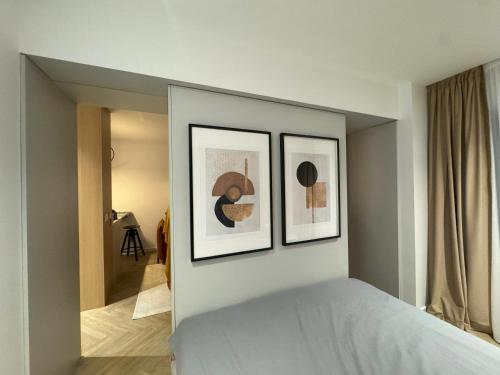 Ένα ή περισσότερα κρεβάτια σε δωμάτιο στο Cozy Studio Sulina