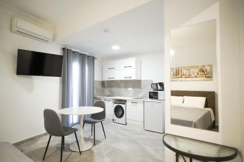 A kitchen or kitchenette at Old Town Studios, Corfu