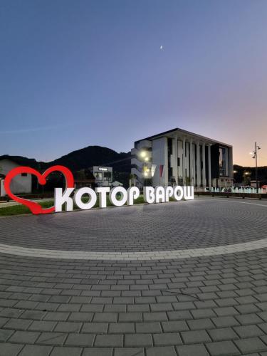 a sign that says kota brook in front of a building at Apartmаn Avram ll in Kotor-Varoš