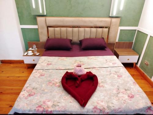 Postel nebo postele na pokoji v ubytování Elysian Residence