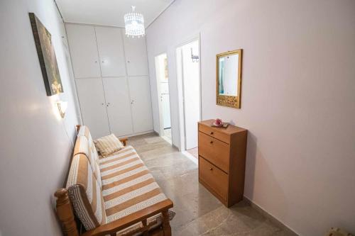 Кровать или кровати в номере ΑPARTMENTS IN THE CENTRE
