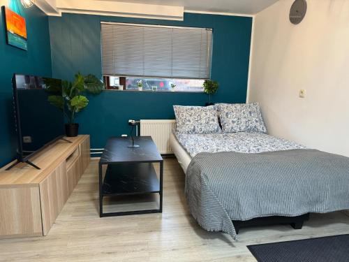 Postel nebo postele na pokoji v ubytování Aurora cozy Apartments