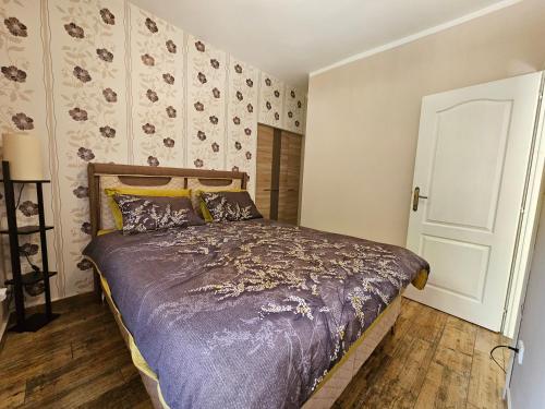 Ένα ή περισσότερα κρεβάτια σε δωμάτιο στο Apartments Krstos place