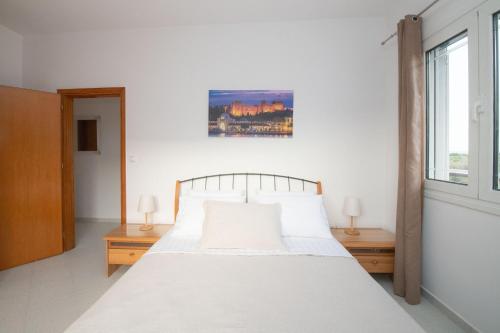 Postel nebo postele na pokoji v ubytování Casa Serena