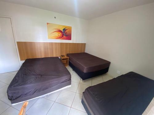 Ένα ή περισσότερα κρεβάτια σε δωμάτιο στο Thermas place