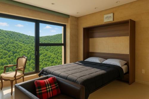 a bedroom with a bed and a large window at Jordan Castle Resort in Irbid