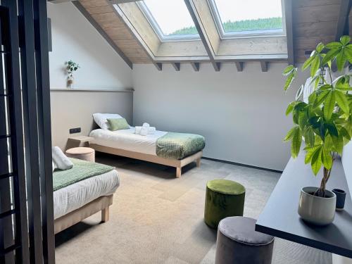 Postel nebo postele na pokoji v ubytování Hôtel L'Echappée Vosgienne - SPA - Salle de Sport