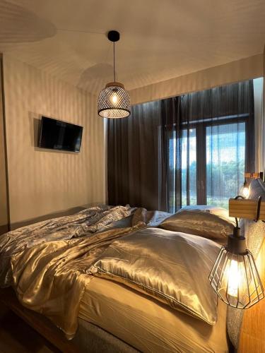 Ένα ή περισσότερα κρεβάτια σε δωμάτιο στο Orraon Luxury Villa
