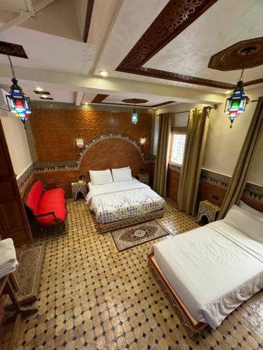 Ένα ή περισσότερα κρεβάτια σε δωμάτιο στο Riad Majorelle