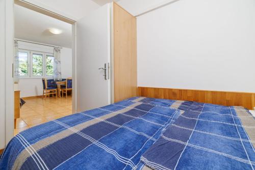 Postel nebo postele na pokoji v ubytování Apartment Regan