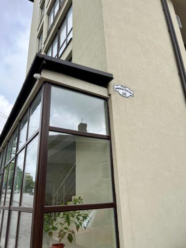 a window on the side of a building at apartments in Ternopil city in Ternopilʼ