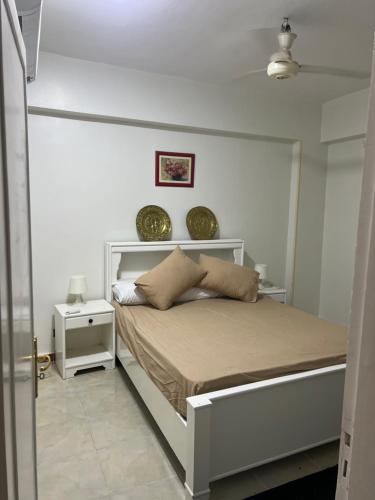 Postel nebo postele na pokoji v ubytování Mohamed Home