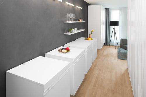 Foto AMANO HOME Apartments 4