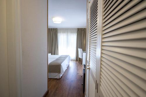 Кровать или кровати в номере Hotel Don Pepe