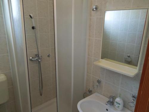 a bathroom with a shower and a sink at Apartments Julia - Studio Apartment Julia 5 in Martinšćica