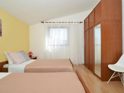 Postel nebo postele na pokoji v ubytování Apartments Nina - Two Bedroom Apartment with Balcony A3