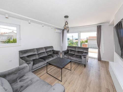 Expansive Retreat with Private Pool & BBQ, Near the Beach - Six Bedroom Villa