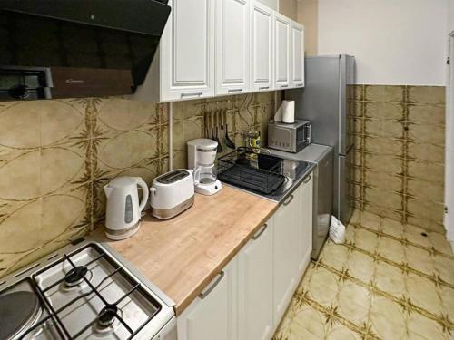 Η κουζίνα ή μικρή κουζίνα στο Apartment with 3 rooms and jacuzzi