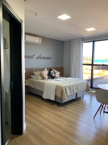 Ένα ή περισσότερα κρεβάτια σε δωμάτιο στο Hotel Alvorada - Trindade do Sul