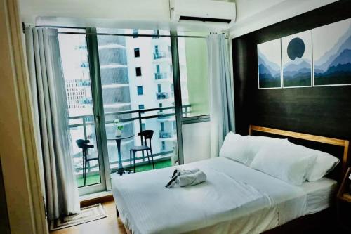 Postel nebo postele na pokoji v ubytování Azure Miami Tower - Mirage Cabin