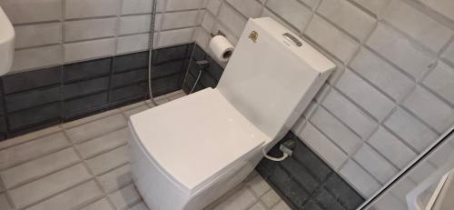 Koupelna v ubytování Araliya inn