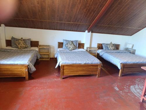 Voodi või voodid majutusasutuse Misty Mount Hostel toas