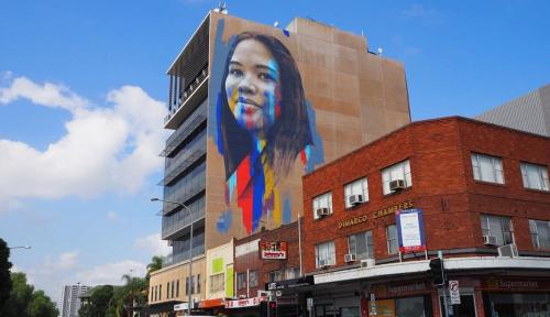 a building with a large mural of a woman on it at Peaceful & Central Stay in Liverpool - Private Double Room - Shared Bathroom in Liverpool