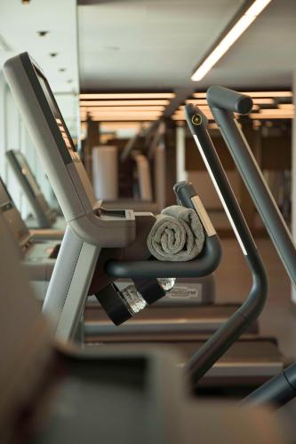 a row of treadmills on a gym at Radisson Blu Hotel, Abidjan Airport in Abidjan
