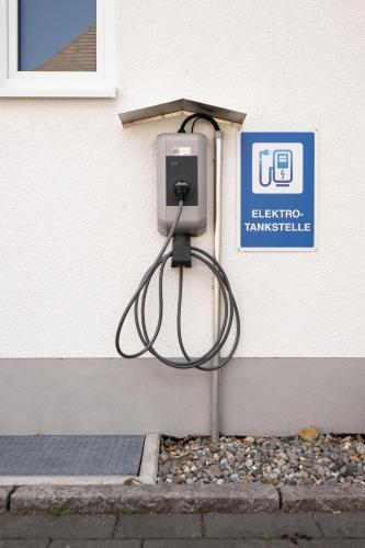 a pay meter attached to the side of a building at Gästehaus GN8 in Rielasingen-Worblingen