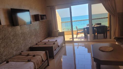 TV a/nebo společenská místnost v ubytování Surf appartement Taghazout 4