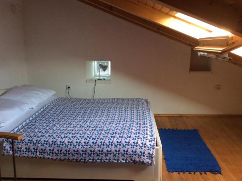 Postel nebo postele na pokoji v ubytování Apartman Ustrine