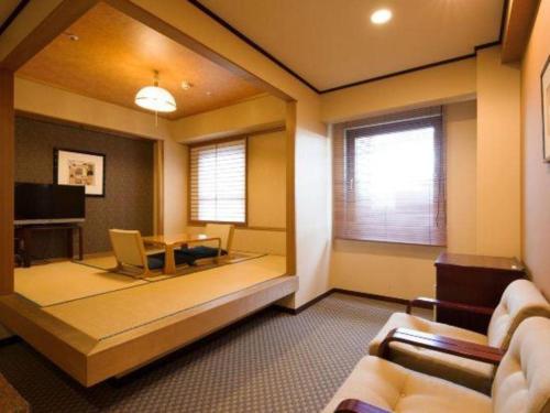 Ένα ή περισσότερα κρεβάτια σε δωμάτιο στο Chisun Hotel Utsunomiya