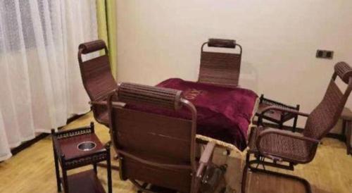 a group of chairs with a blanket on them at IU Hotel Taiyuan Changfeng West Street The Mixc in Taiyuan