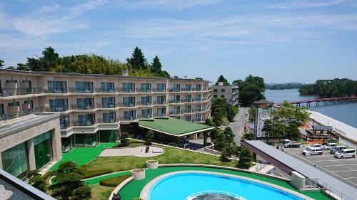 arial view of a hotel with a swimming pool at 松島センチュリーホテル in Matsushima
