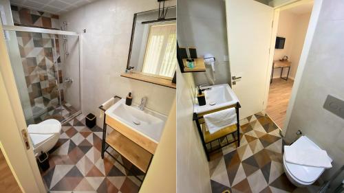 a bathroom with a sink and a toilet at Sahil Otel in Cesme