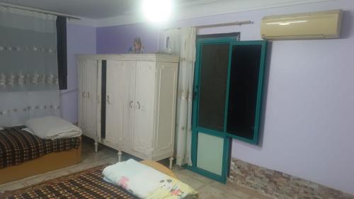 شقة مفروشة بالكامل والأجهزة والتكييفات ببورفؤاد بابراج محمدعلي ببورفؤاد