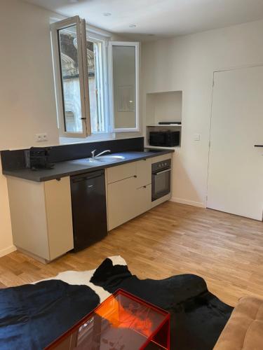 Køkken eller tekøkken på Petit nid douillet centre-ville