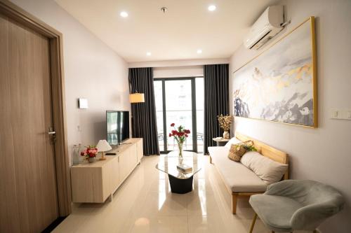 TV a/nebo společenská místnost v ubytování MILY APARTMENT- NERA Garden 2 - Hue