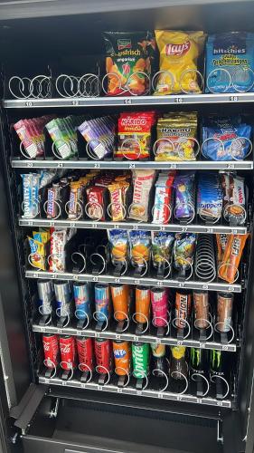 a refrigerator filled with lots of food and drinks at Perle der Wetterau - Smart TV - 3 Zimmer - Parkplatz in Butzbach