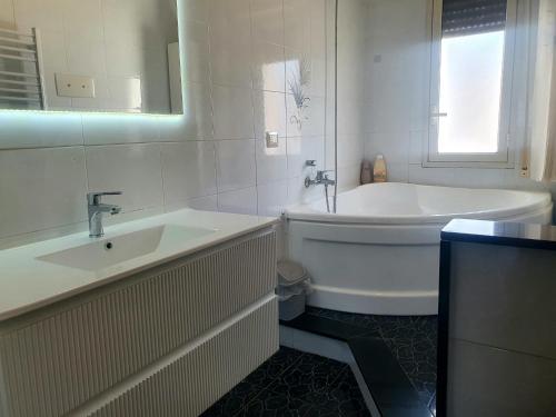 Koupelna v ubytování Terrazza sul Mare Vecchio Pontile