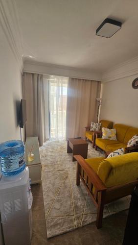 a living room with two couches and a couch at Padmore Residences - B1506 in Nairobi
